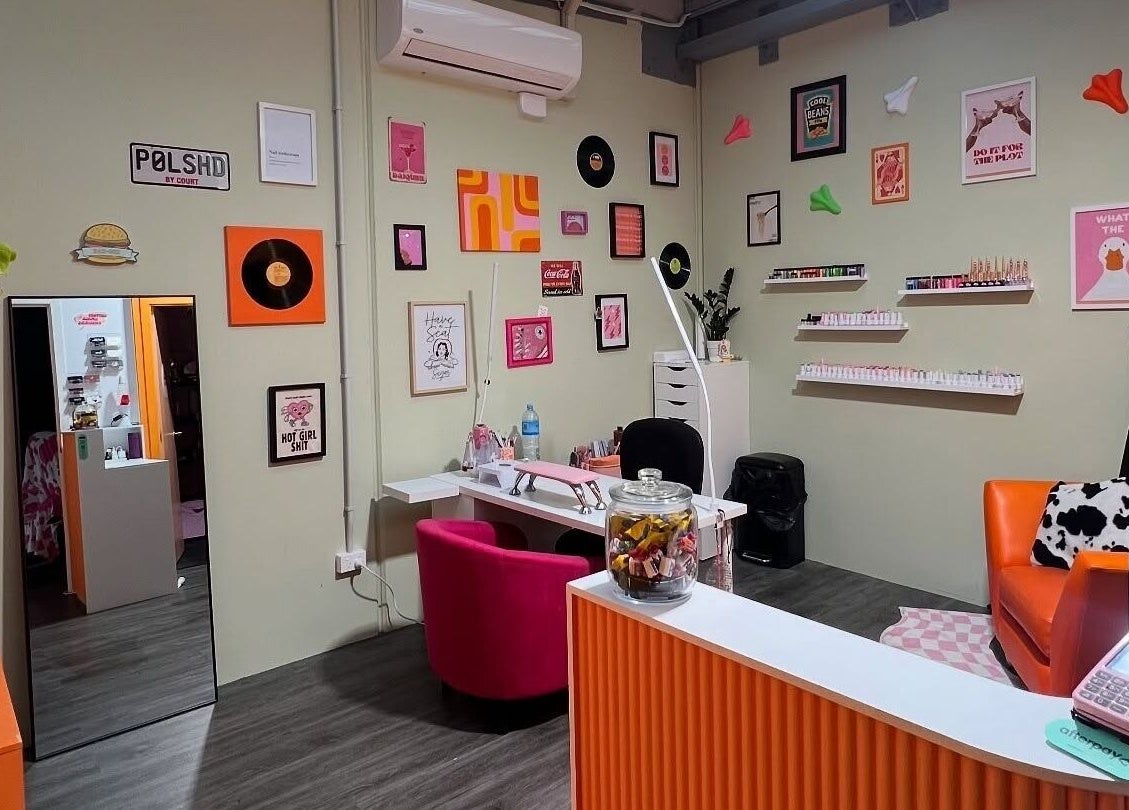 Trendy nail salon interior at Polished By Court in Auckland, Auckland, NZ with vibrant decor and cozy seating.