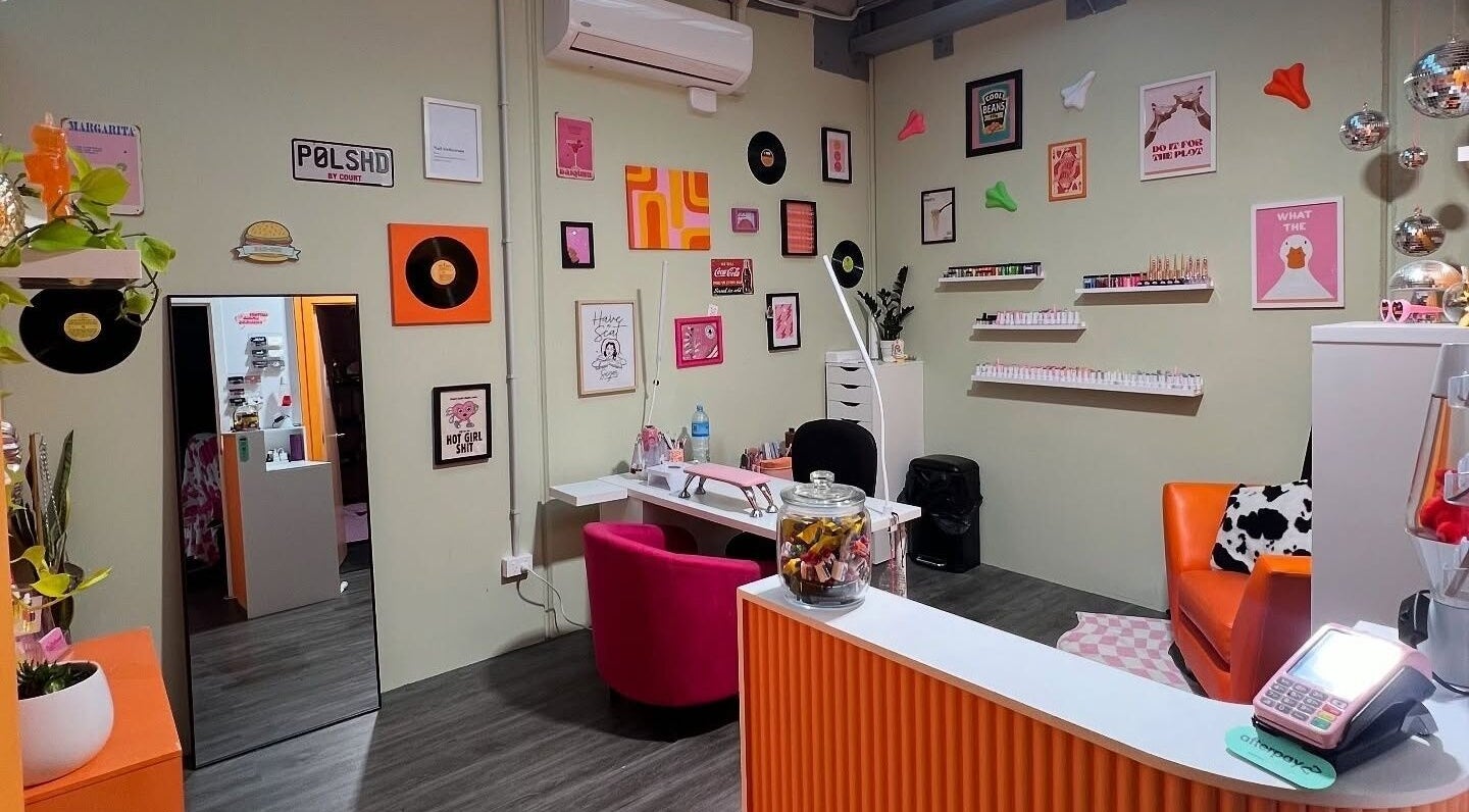 Trendy nail salon interior at Polished By Court in Auckland, Auckland, NZ with vibrant decor and cozy seating.