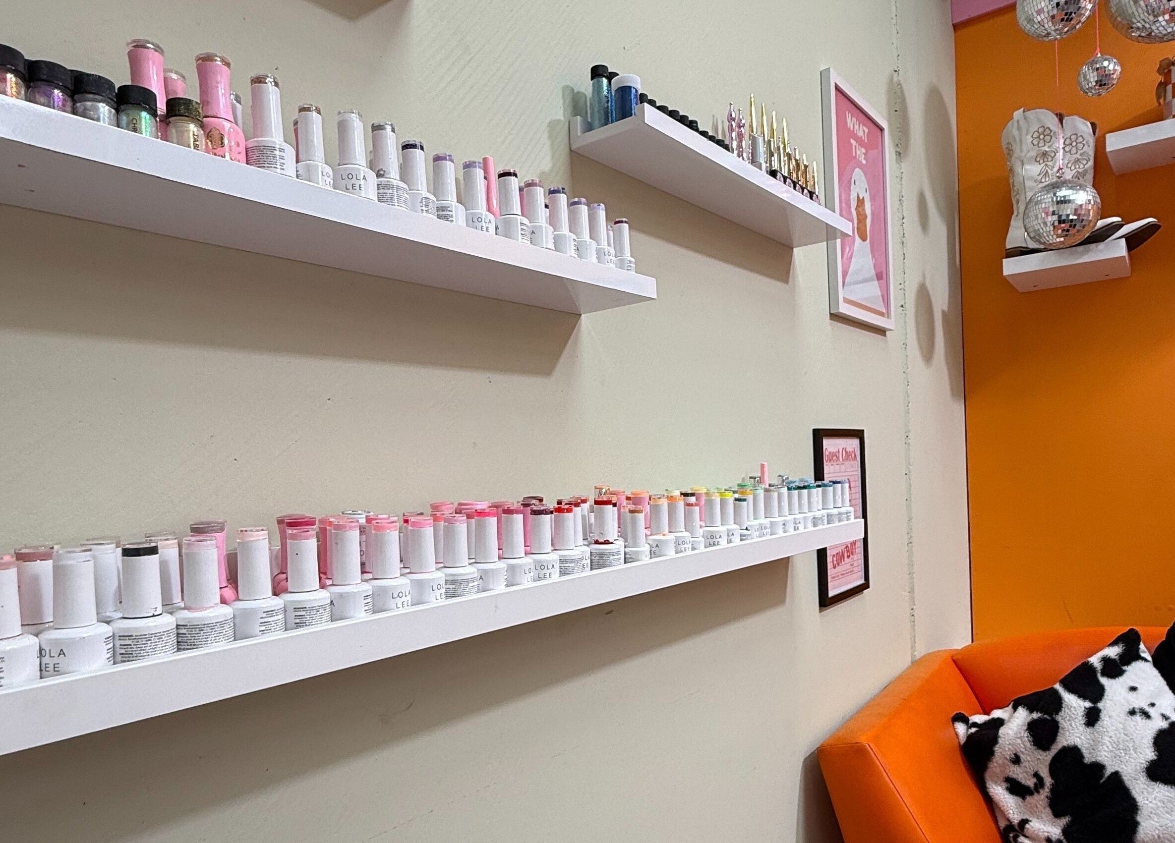 Polished By Court showcases vibrant nail polish on shelves in Auckland, Auckland, NZ.