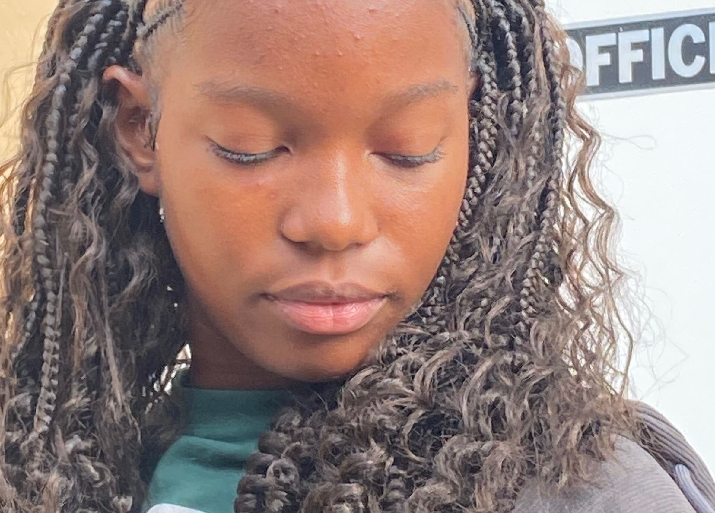 Elegant braided hairstyle at Mona's Beauty Spot, Bridgetown, Saint Philip, BB.