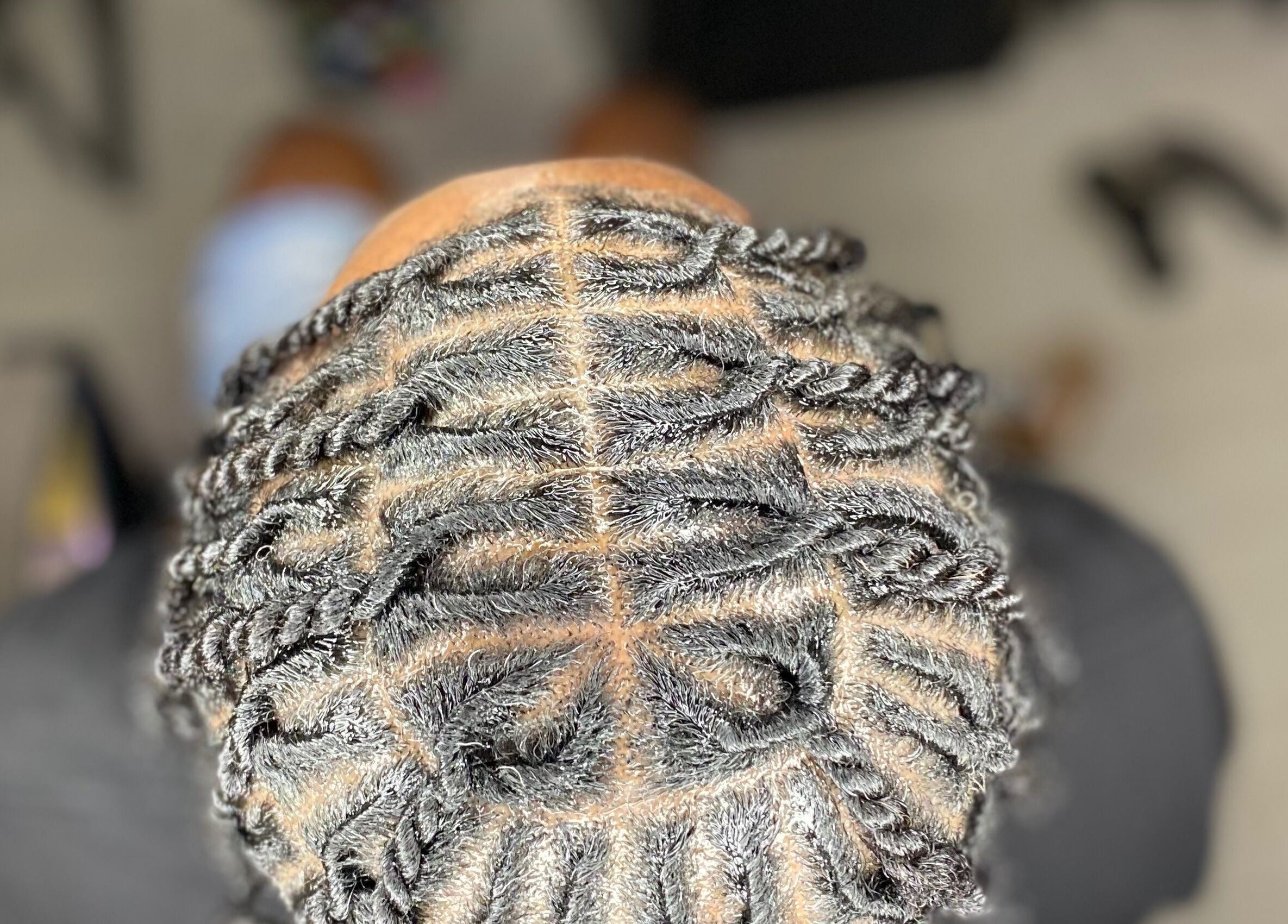 Intricate twist hairstyle at Mona's Beauty Spot, Bridgetown, Saint Philip, BB.