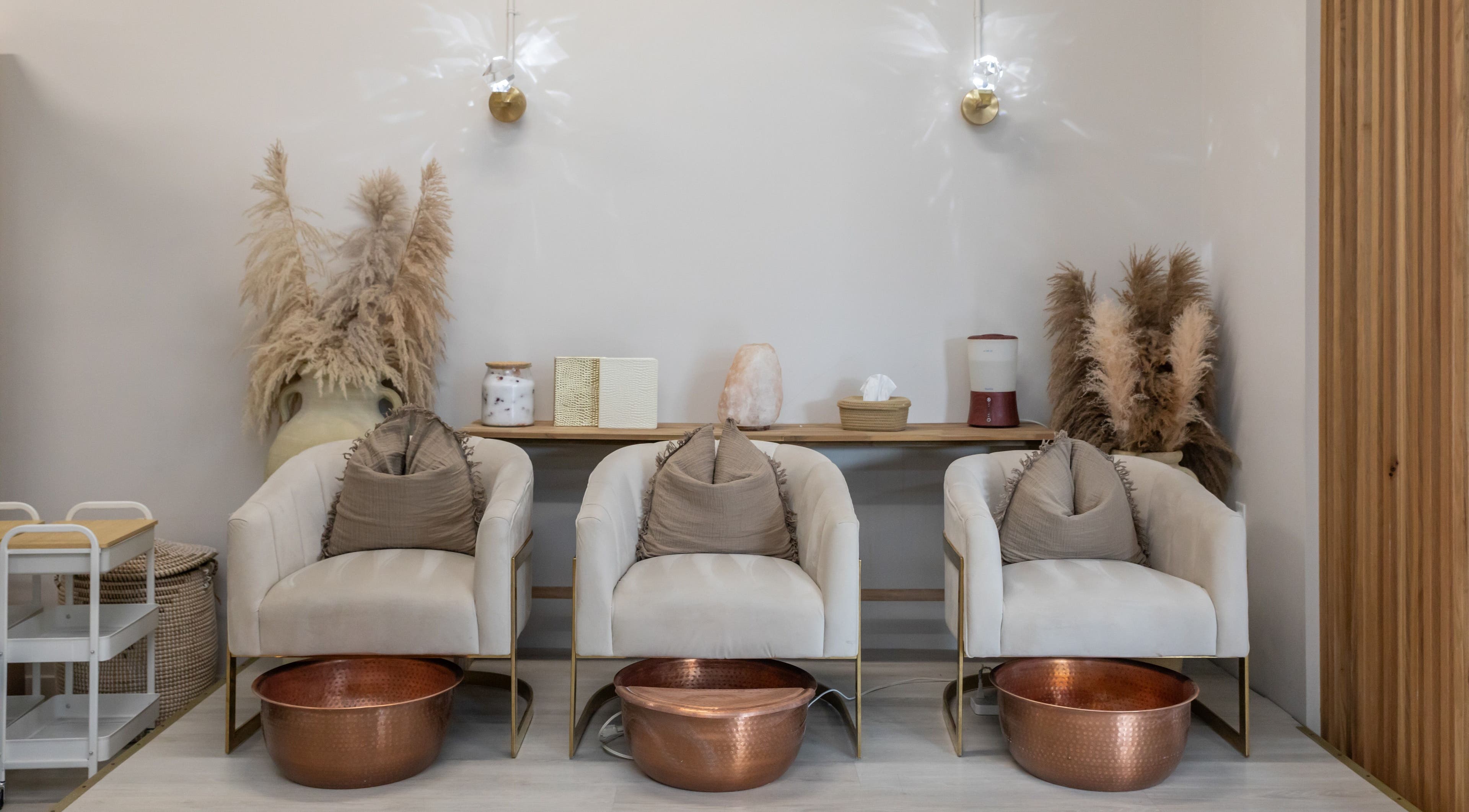 Cozy seating and decor at Salt Day Spa in Leduc, Alberta, CA, for a relaxing pampering experience.