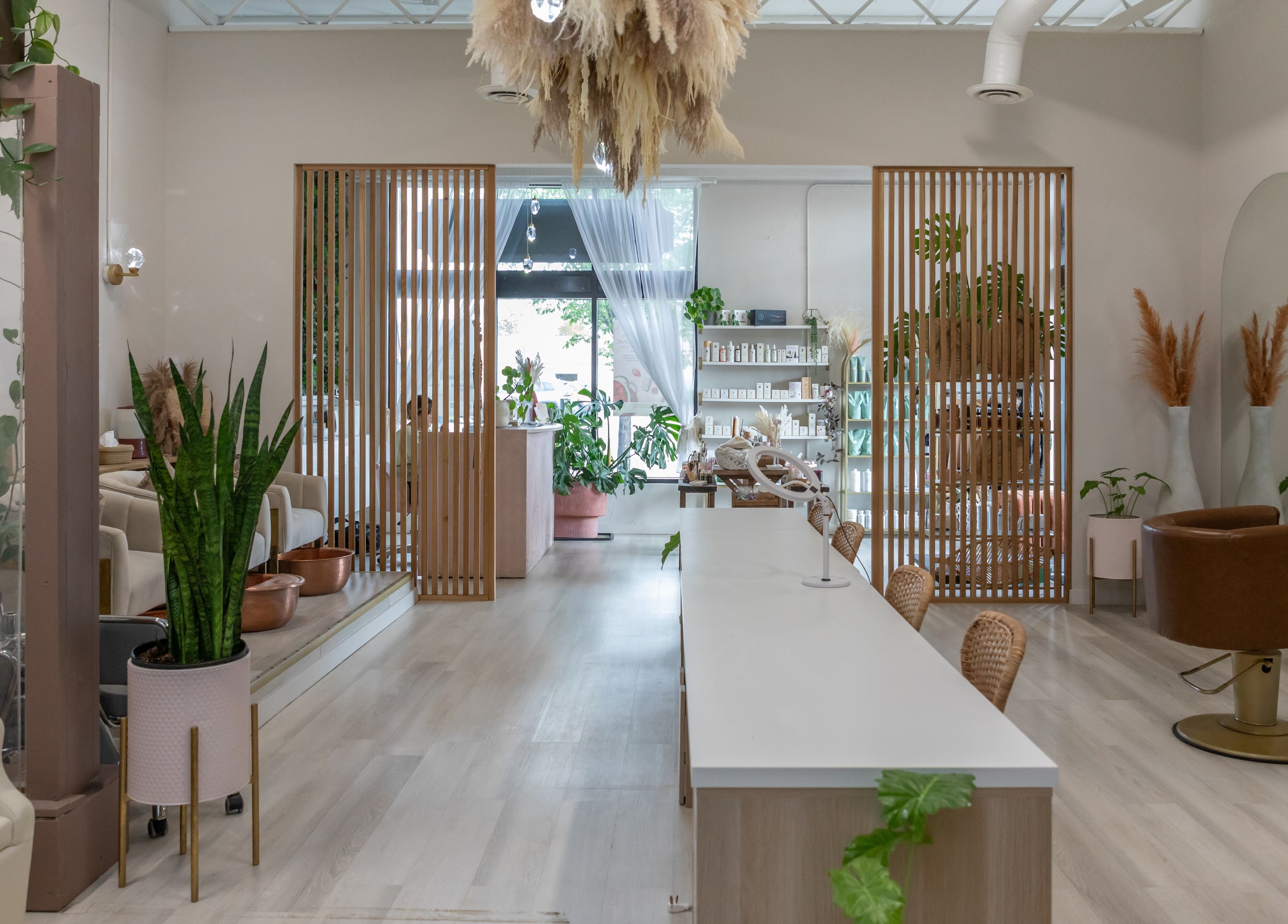 Calming interior of Salt Day Spa in Leduc, Alberta, CA with plants and modern decor.