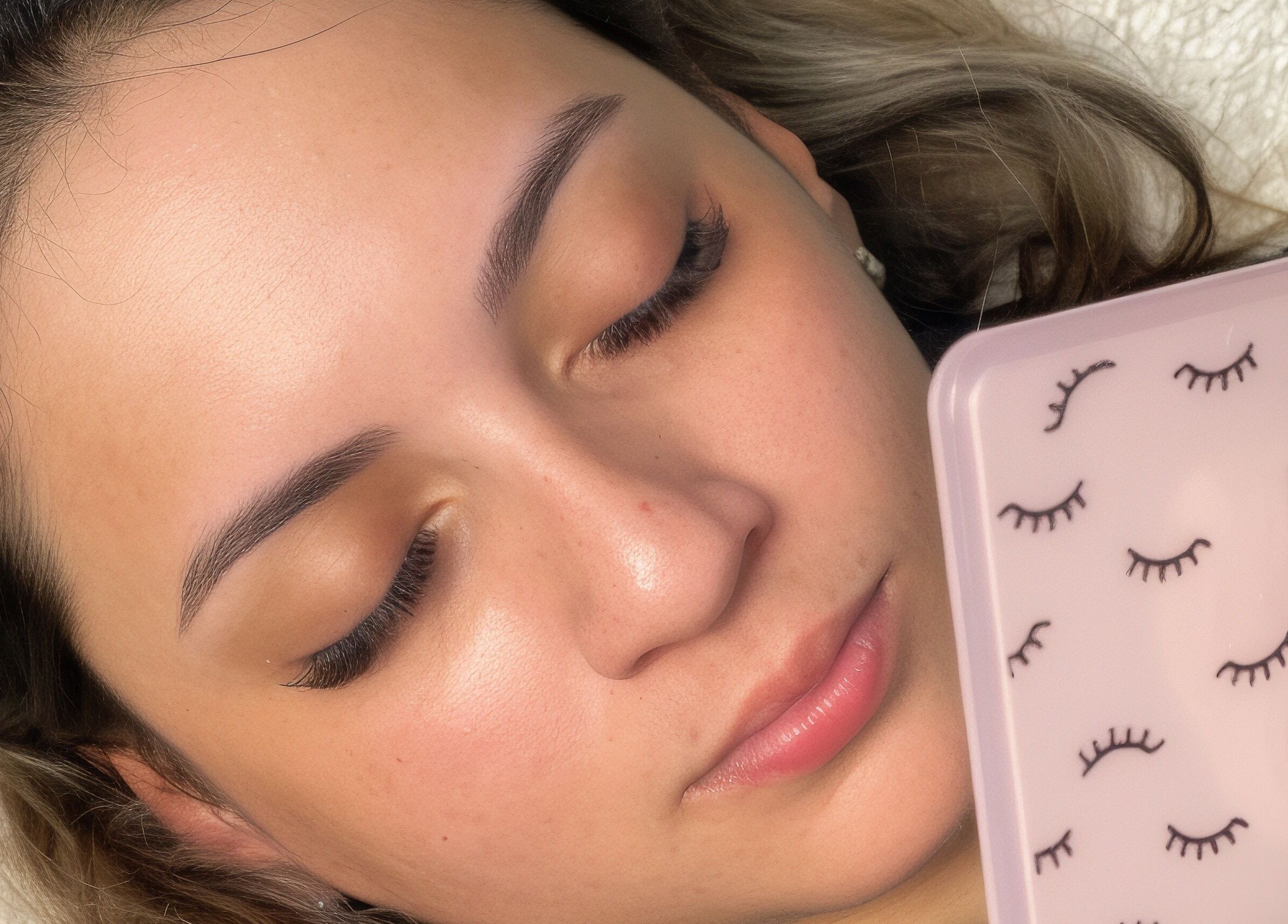 Woman showcasing Mynx Lashes extension with closed eyes. Located in Cape Town, Western Cape, ZA.