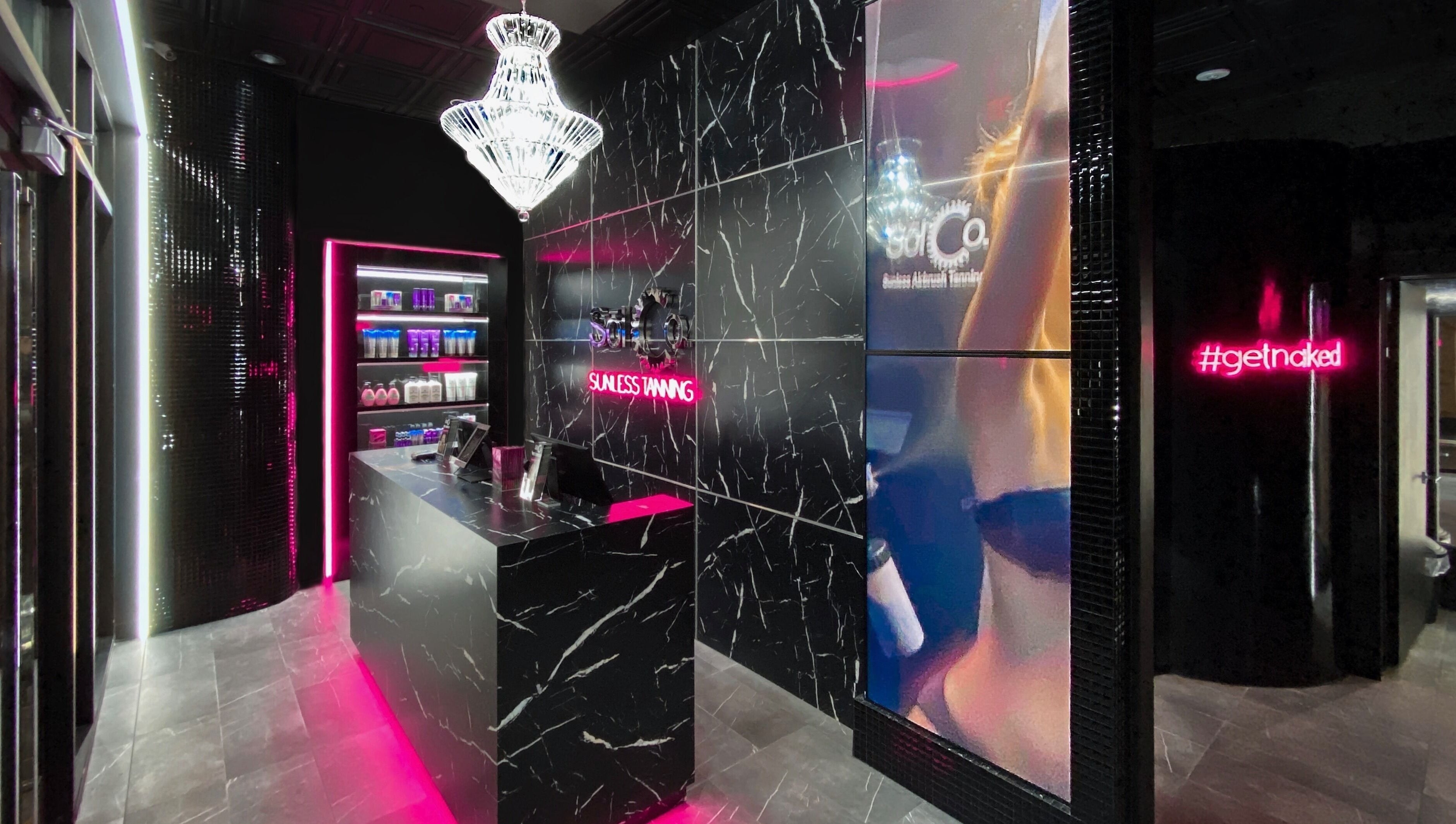 Chic interior of Sol Sunless Tanning - Dallas Mockingbird, Dallas, Texas, US, featuring stylish decor.