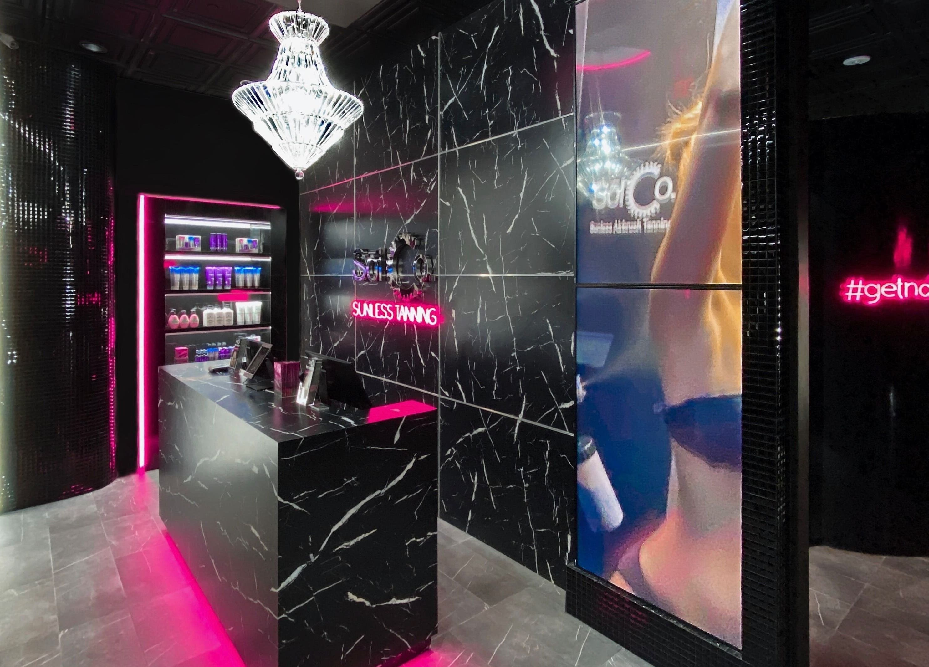 Chic interior of Sol Sunless Tanning - Dallas Mockingbird, Dallas, Texas, US, featuring stylish decor.