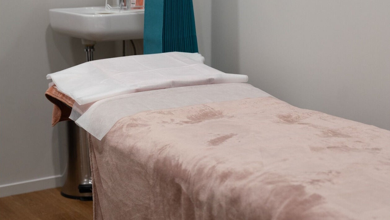 Cozy treatment bed at The Spa Nomad | Auckland (Mobile Business), ensuring relaxation in Auckland, Auckland, NZ.