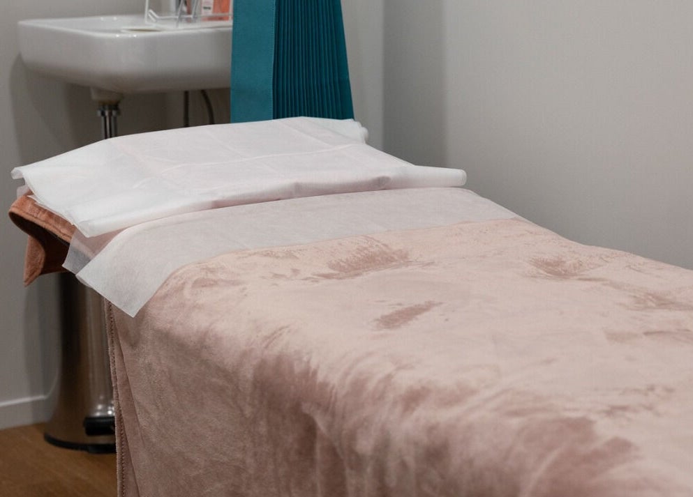 Cozy treatment bed at The Spa Nomad | Auckland (Mobile Business), ensuring relaxation in Auckland, Auckland, NZ.