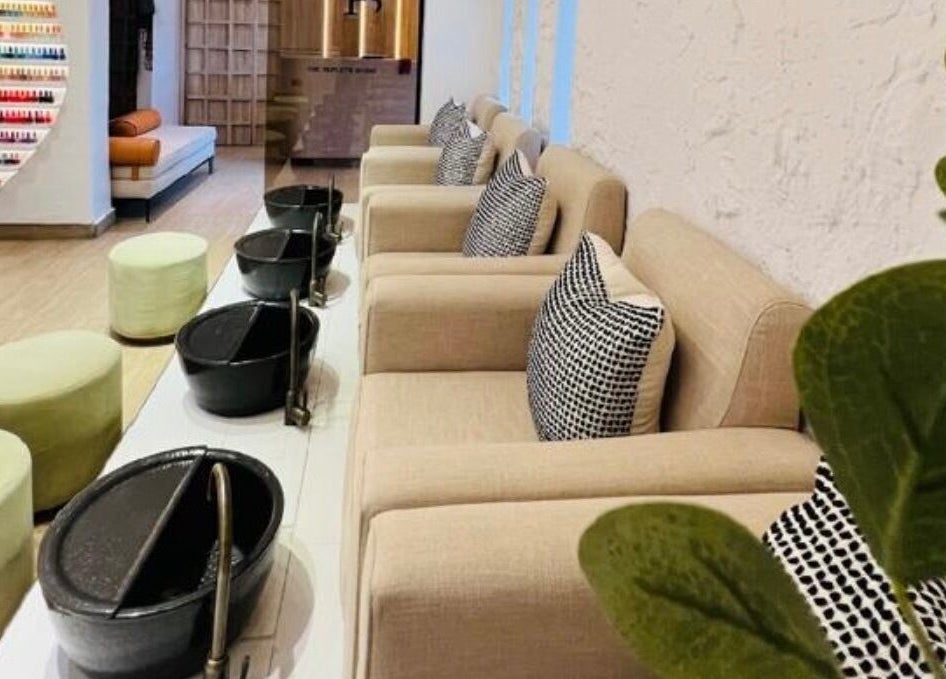 Relaxing spa area at The Triplets Studio in Lagos, Lagos, NG with plush seating and serene decor.