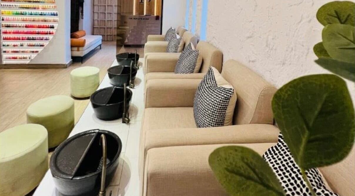 Relaxing spa area at The Triplets Studio in Lagos, Lagos, NG with plush seating and serene decor.