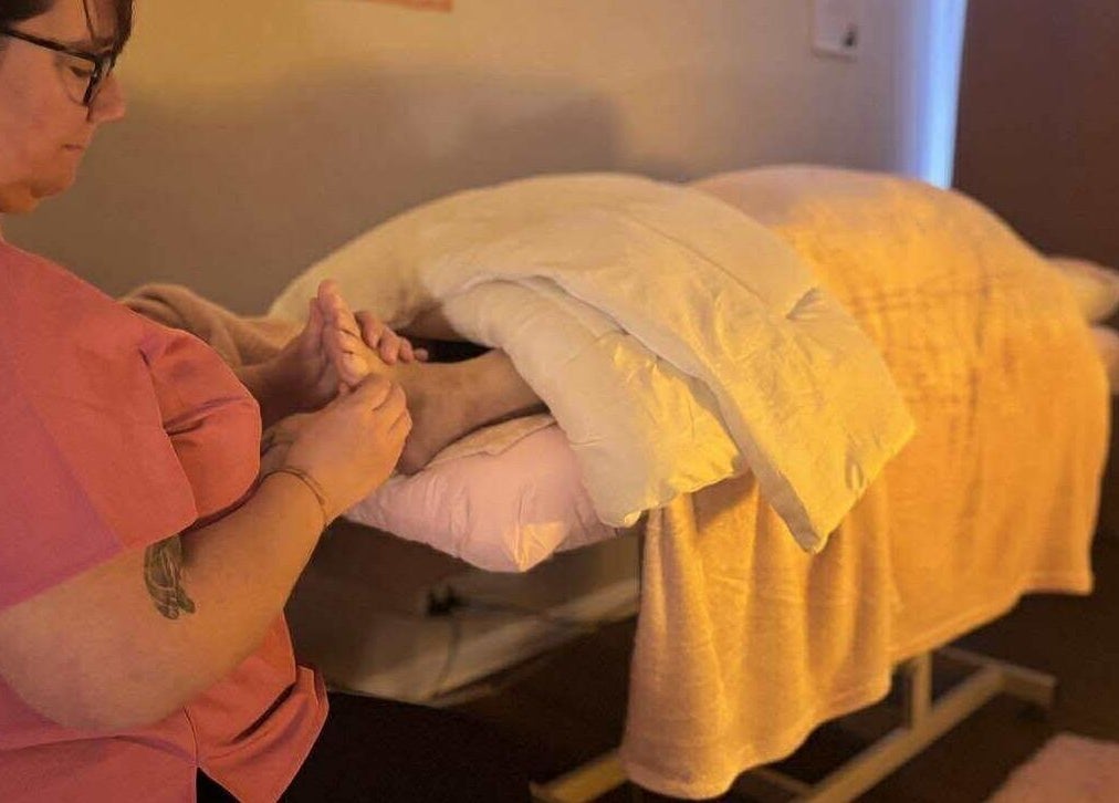 Relaxing foot massage at Heaven In A Touch, Bertram, Western Australia, AU in serene spa setting.