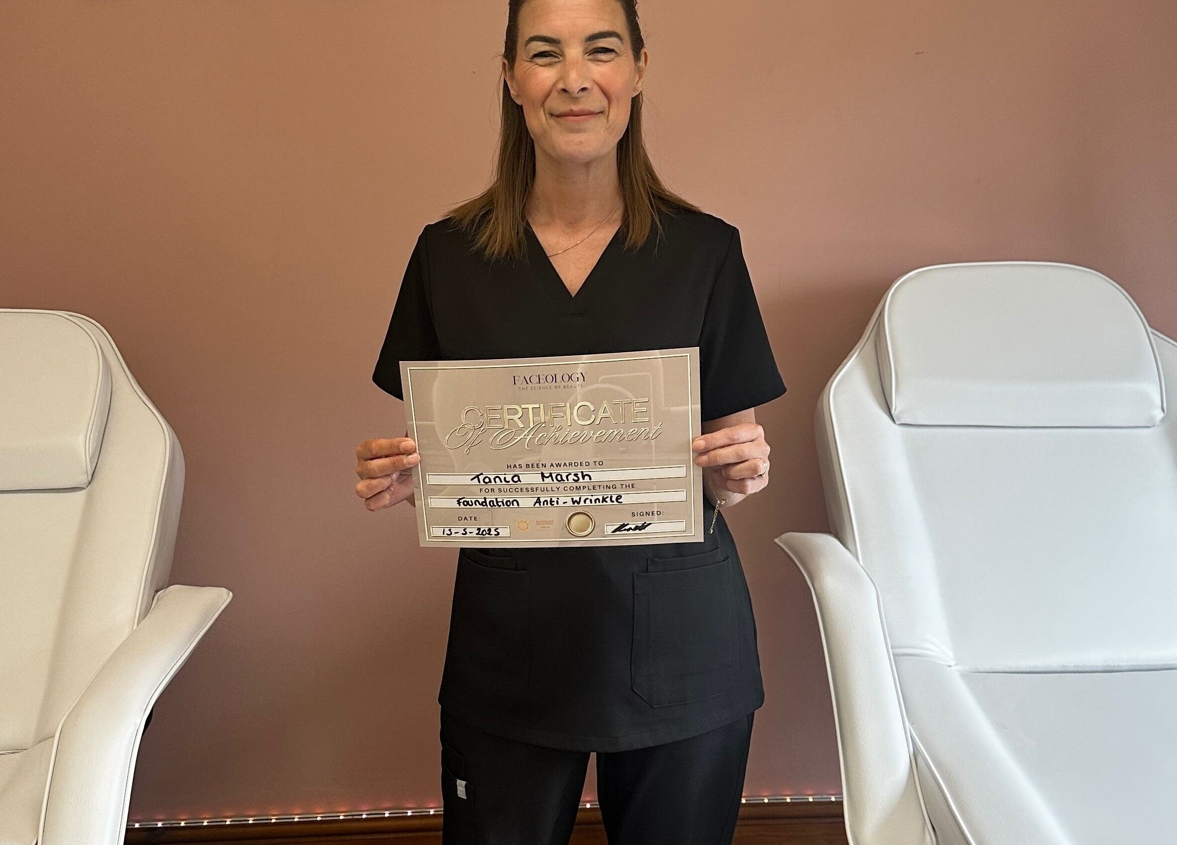 Aesthetic practitioner holding certificate at Restore - Pmu & Aesthetics, Hythe, England, GB.