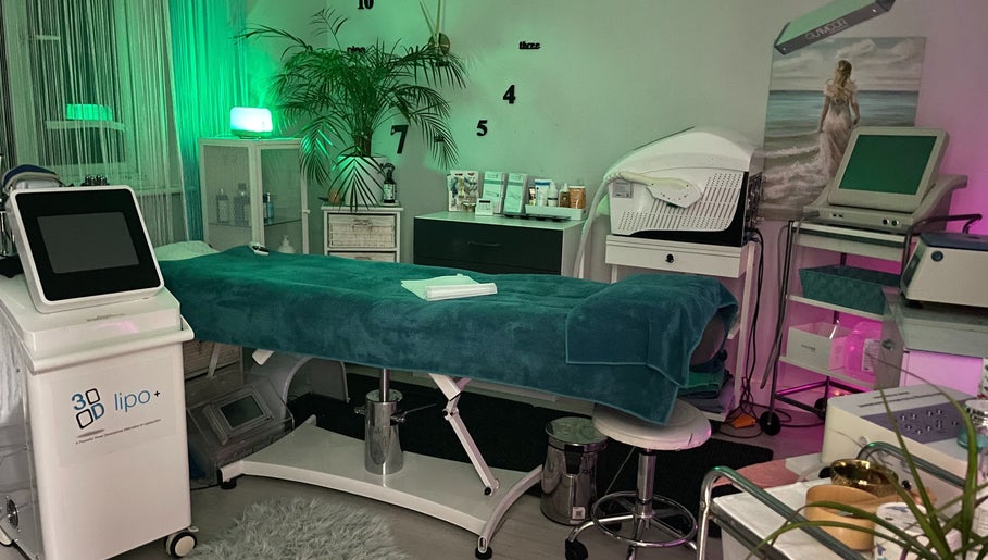 Luxury treatment room at Cambridge Cosmetology in Cambridge, England, GB showcasing advanced equipment and decor.