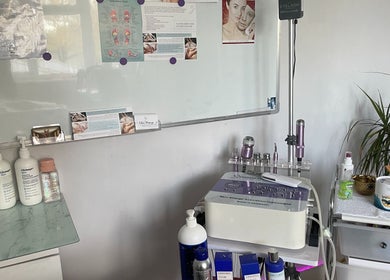 Cambridge Cosmetology's treatment room with skincare products in Cambridge, England, GB.