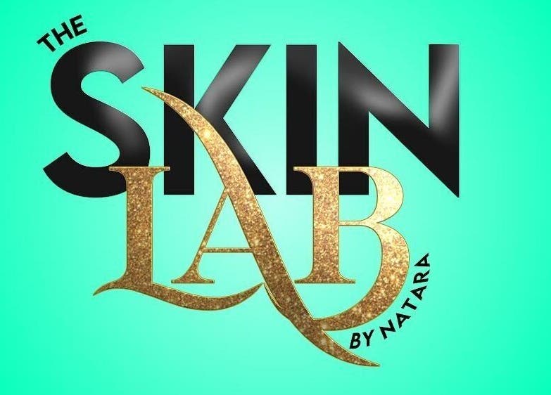 The Skin Lab logo with gold accents, Bridgetown, Saint Michael, BB.