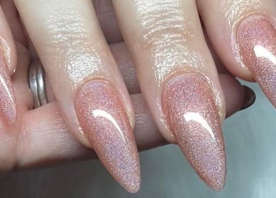 Elegantly manicured shimmering nails at AmyEBeauty, Suffolk, England, GB.