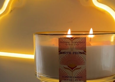 Scented candle at AmyEBeauty, Suffolk, England, GB, providing a serene ambiance with a peaceful glow.