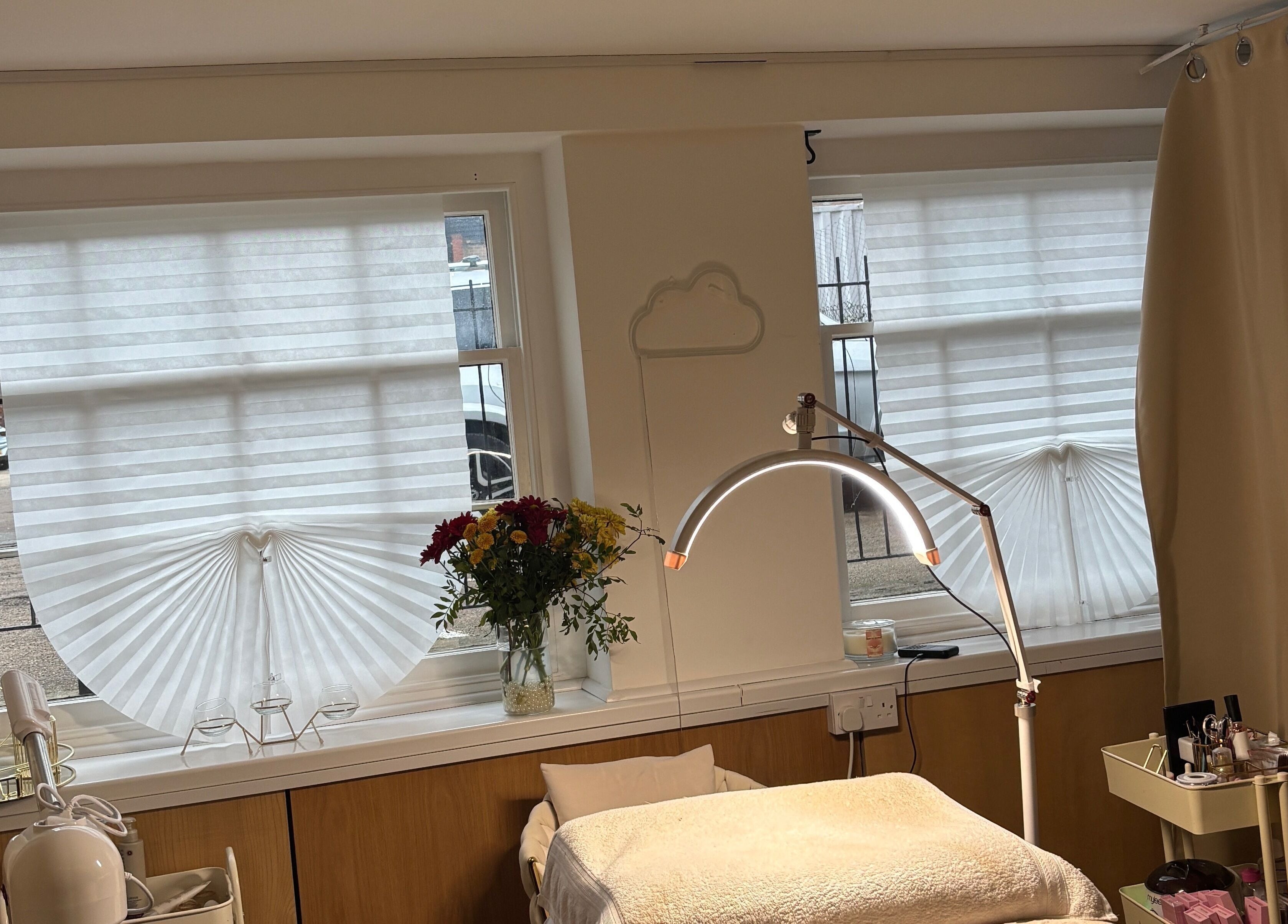 Calming beauty treatment area at AmyEBeauty, Sudbury, England, GB, featuring cozy decor and natural lighting.