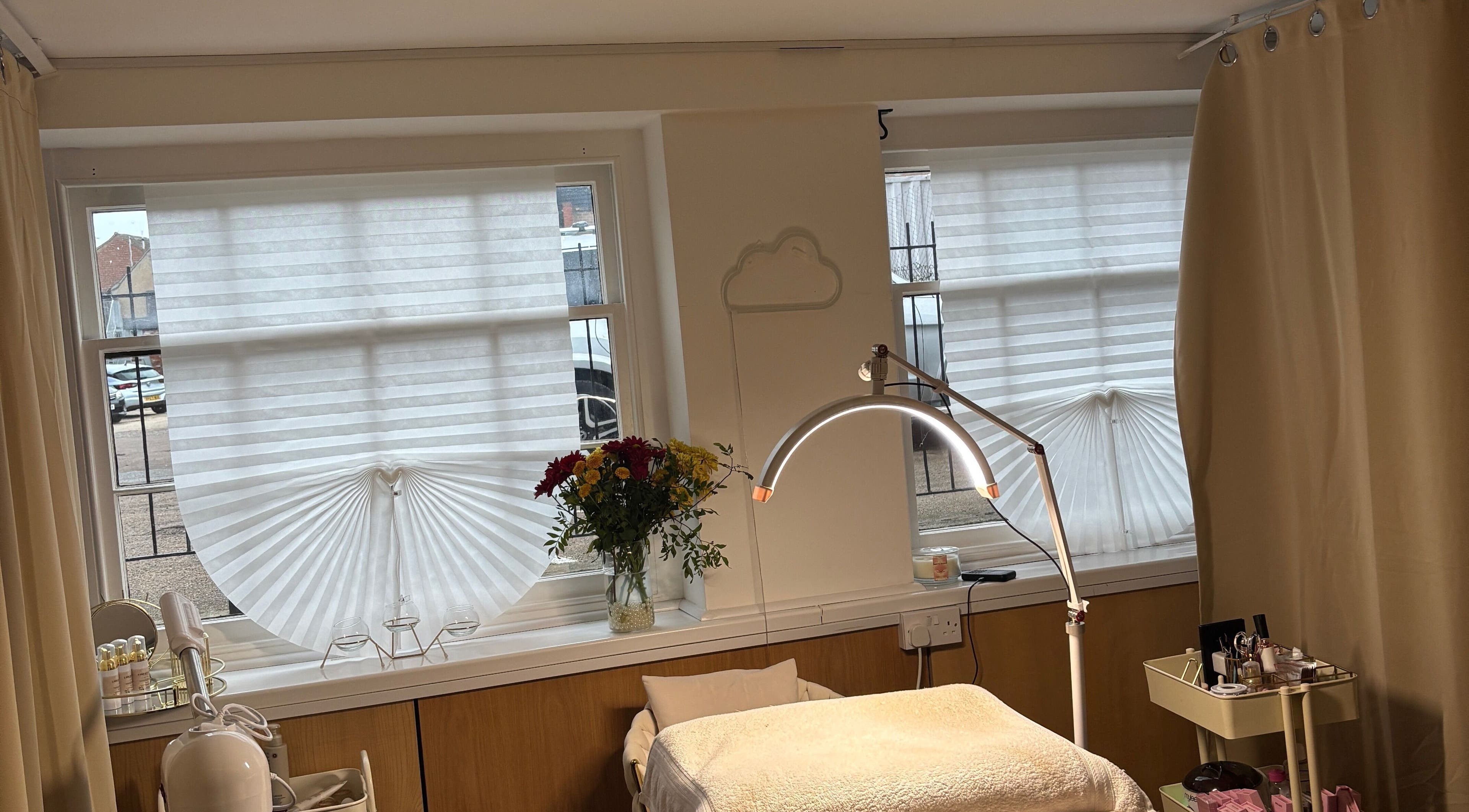 Calming beauty treatment area at AmyEBeauty, Sudbury, England, GB, featuring cozy decor and natural lighting.