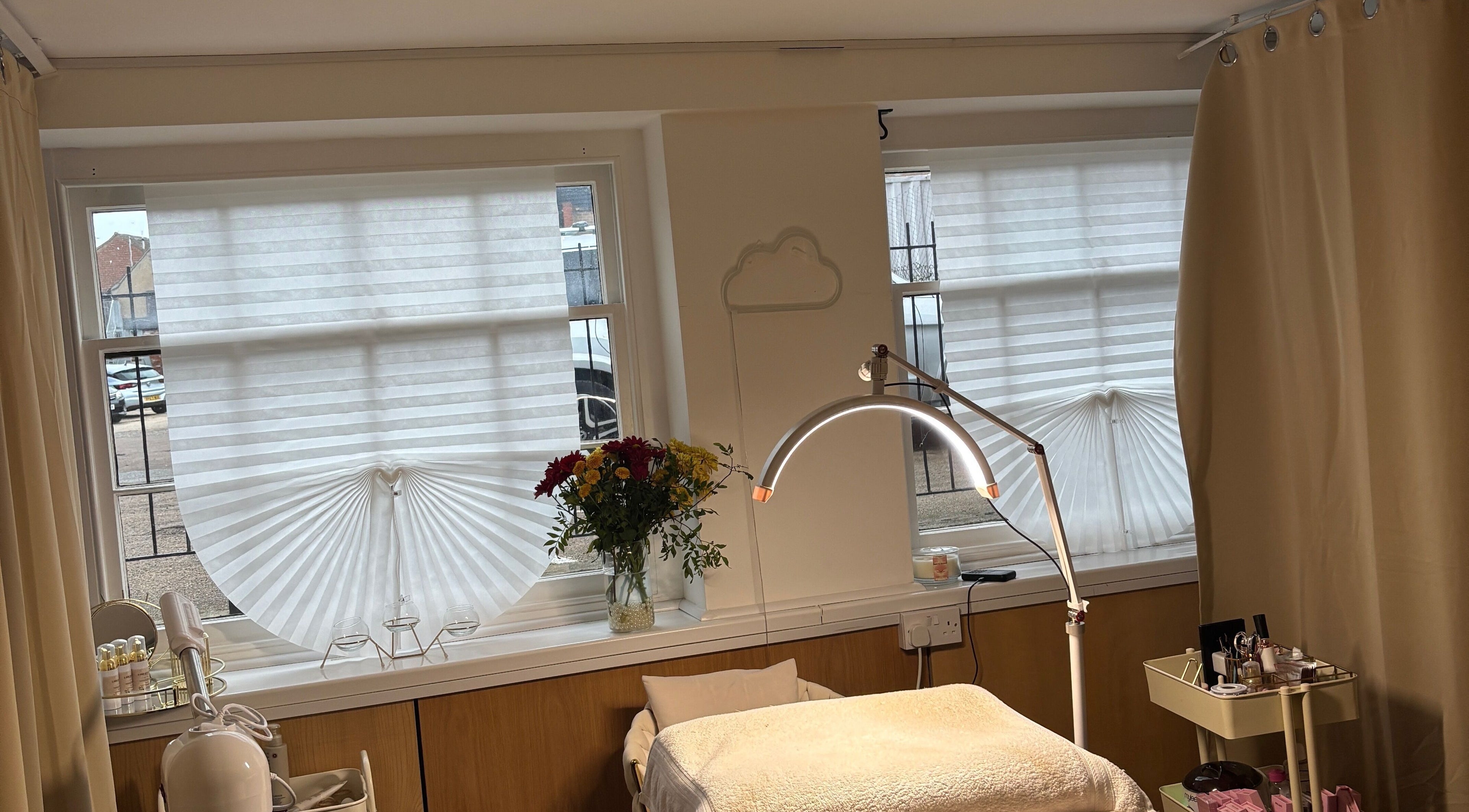 Calming beauty treatment area at AmyEBeauty, Sudbury, England, GB, featuring cozy decor and natural lighting.