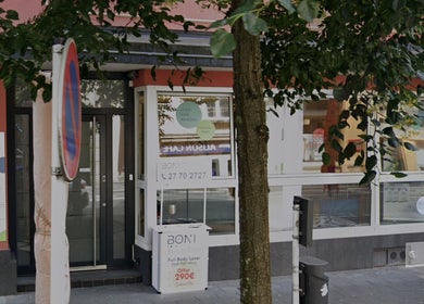 Front view of Boni Beauty Clinic in Luxembourg, displaying modern architecture and signage.