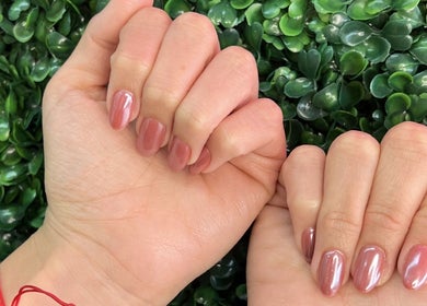 Glossy manicure showcasing elegant nails at Dominican Salon - West Kendall, Miami, Florida, US.