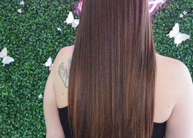 Smooth, straight hair showcased at Dominican Salon - West Kendall, Miami, Florida, US.