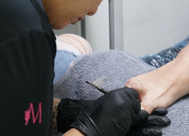 Professional pedicure at Dominican Salon - West Kendall, Miami, Florida, US, showcasing nail care expertise.