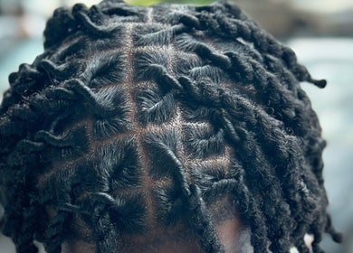 Intricate hair twists styled at Nonniestylez, Decatur, Georgia, US, showcasing expert craftsmanship.