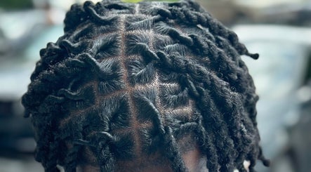 Intricate hair twists styled at Nonniestylez, Decatur, Georgia, US, showcasing expert craftsmanship.