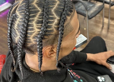 Close-up of intricate braids at Nonniestylez, Decatur, Georgia, US.