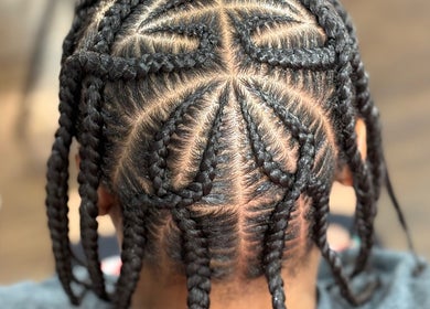Intricate braided hairstyle at Nonniestylez, Decatur, Georgia, US, showcasing expert styling craftsmanship.
