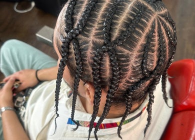 Intricate braids styled at Nonniestylez, Decatur, Georgia, US, showcasing expert handwork and precision.