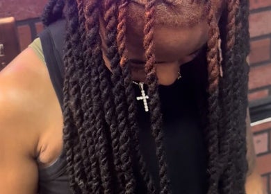 Detailed shot of intricate braids at Nonniestylez, Decatur, Georgia, US.