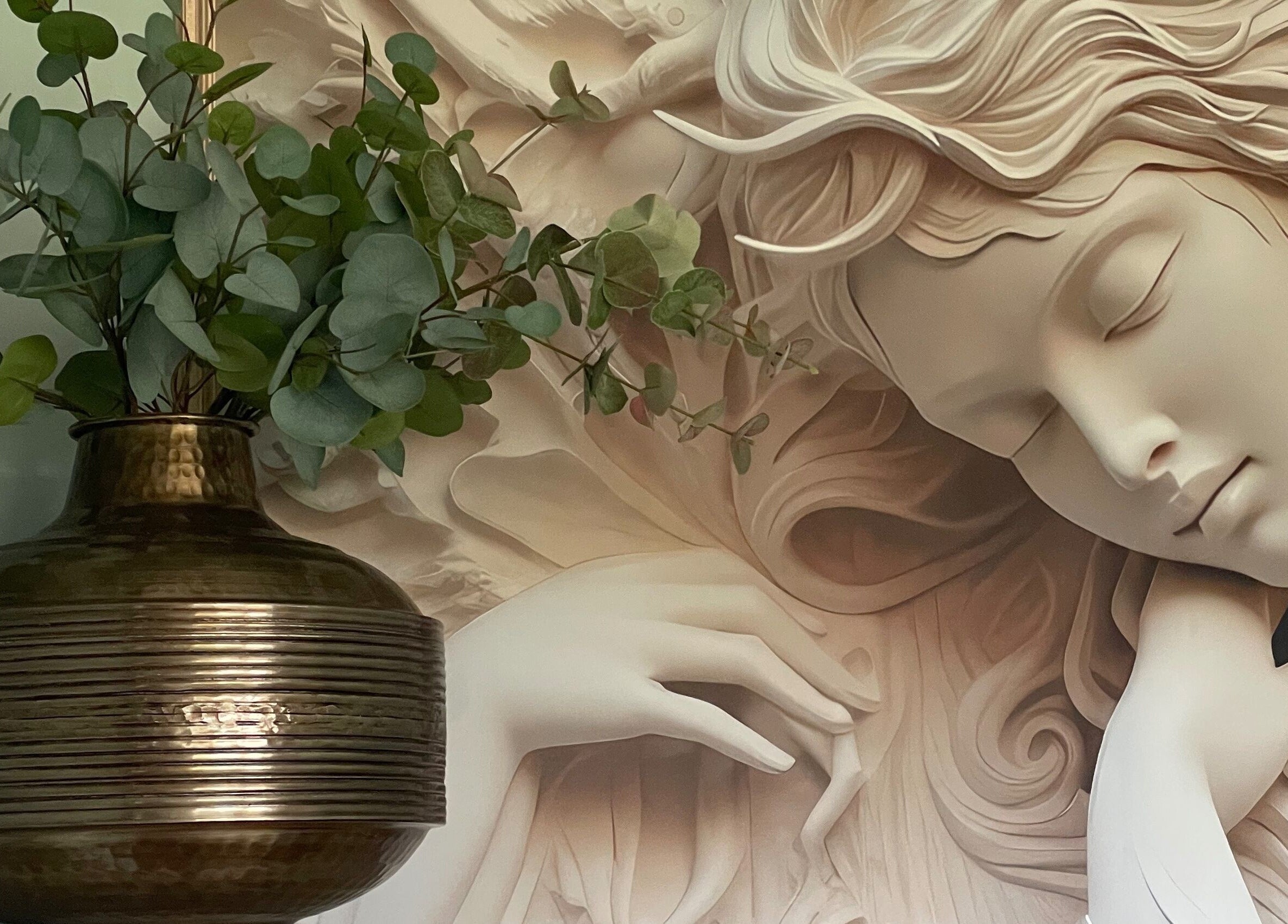 Serene sculpture with greenery at Oxley Aesthetics, Hemel Hempstead, England, GB, enhancing tranquil ambiance.