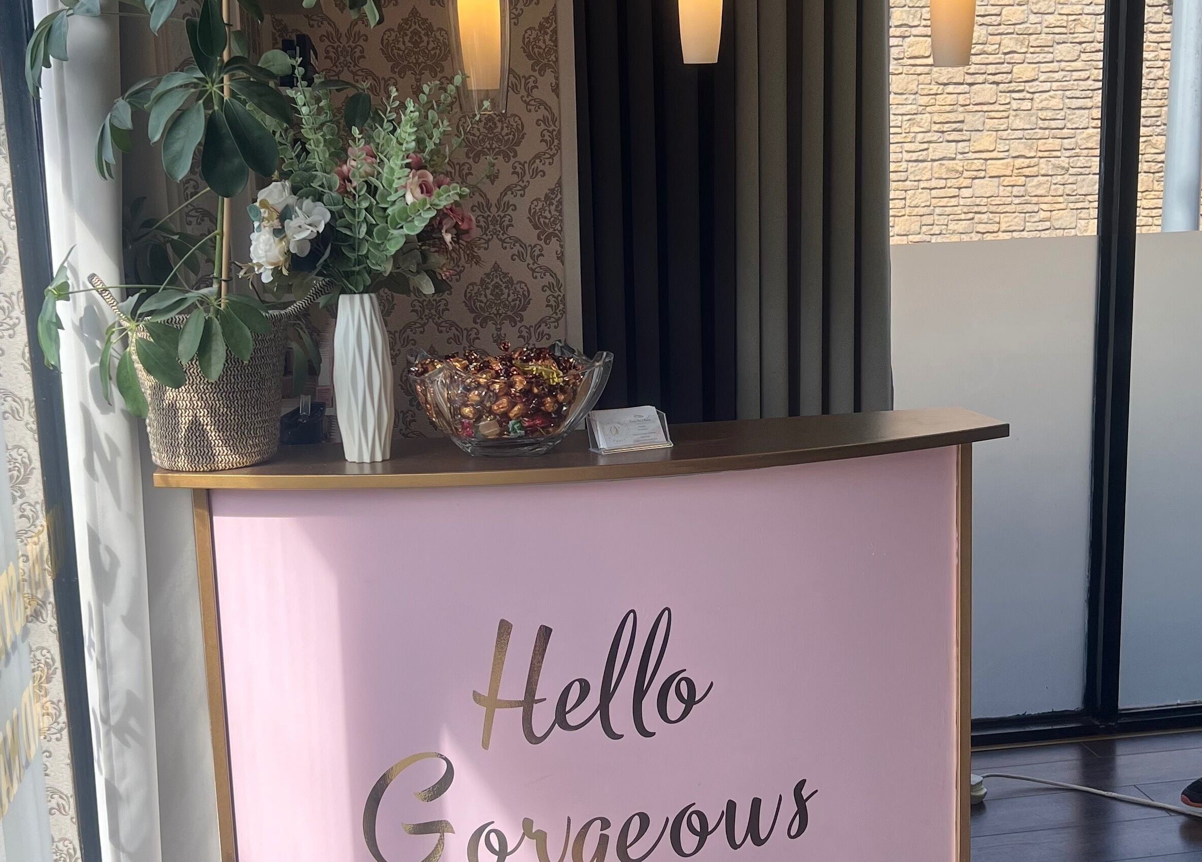 Inviting reception at Cristyle Hair And Beauty, Mullingar, County Westmeath, IE with elegant decor and floral accents.