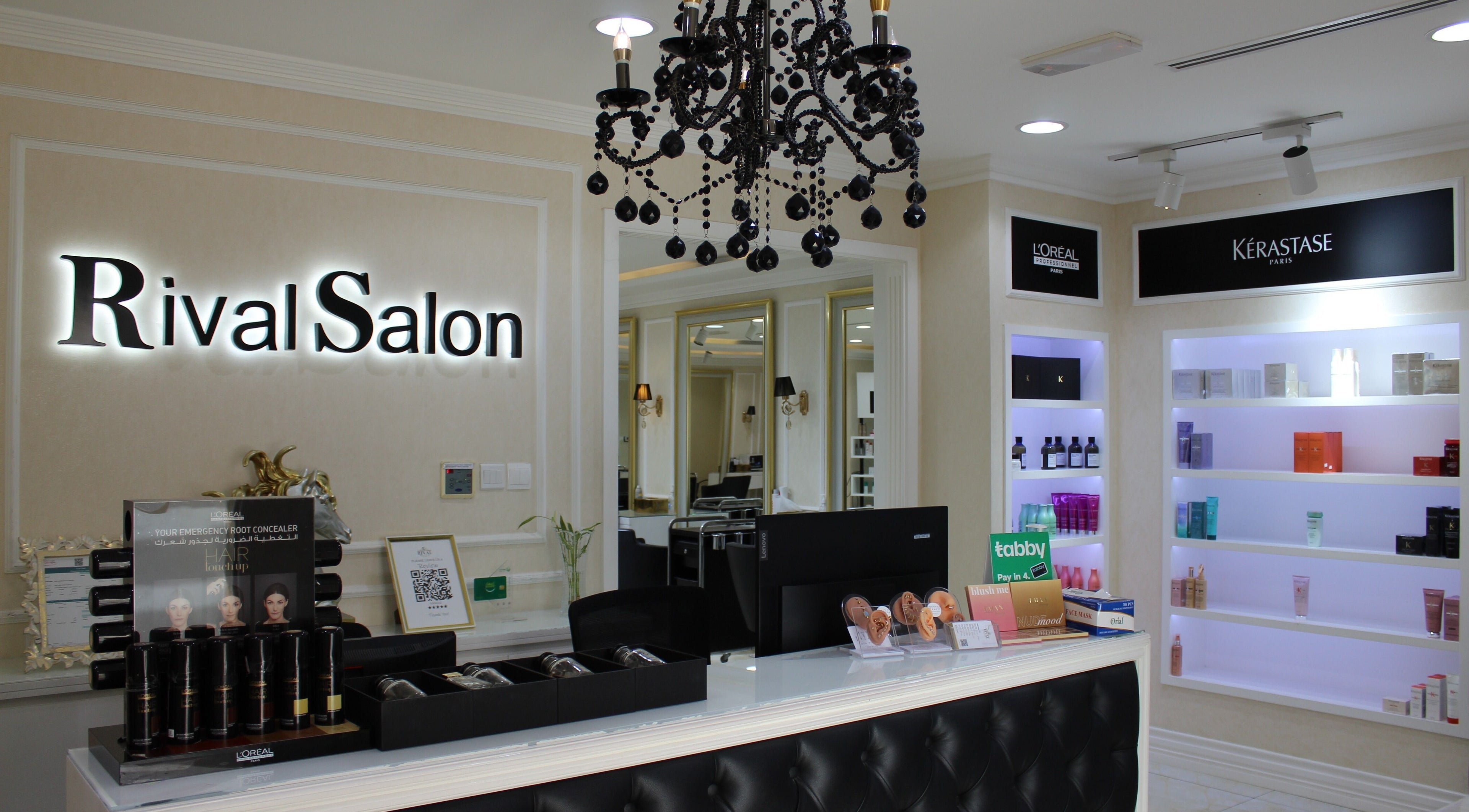 Reception area of Rival Ladies Beauty Salon Jumeirah, Dubai, AE with elegant decor and beauty products.
