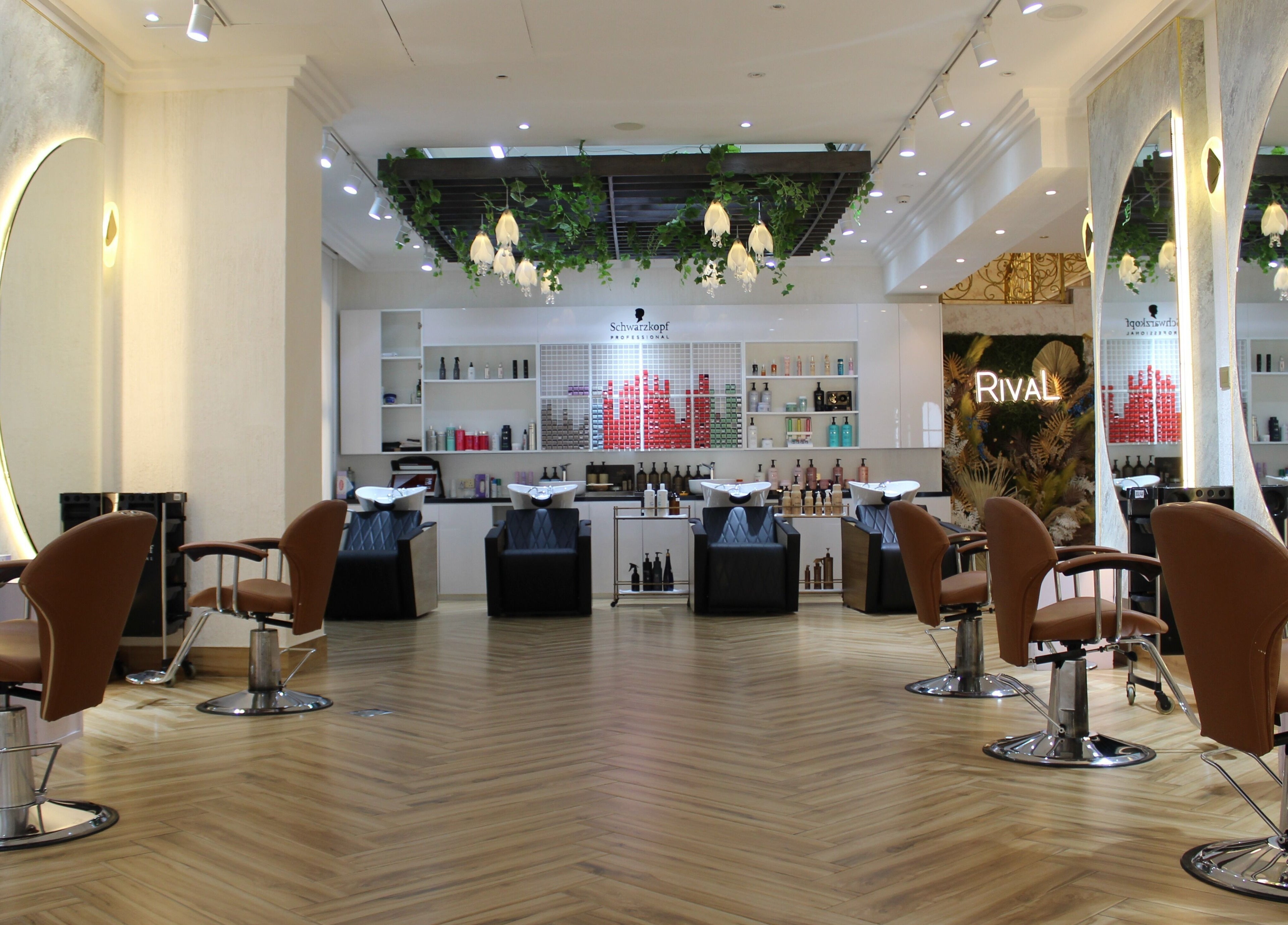 Modern salon chairs and mirrors at Rival Sister Salon L.L.C Sisters in Abu Dhabi, AE, showcasing chic style.