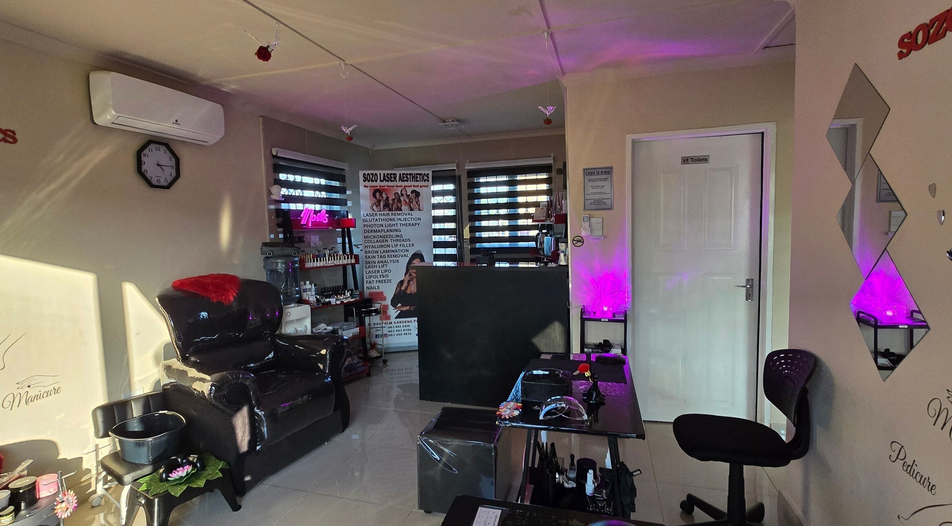 Chic interior of Sozo Laser Aesthetics in Phoenix, Kwazulu-natal, ZA, featuring modern decor and a relaxing atmosphere.