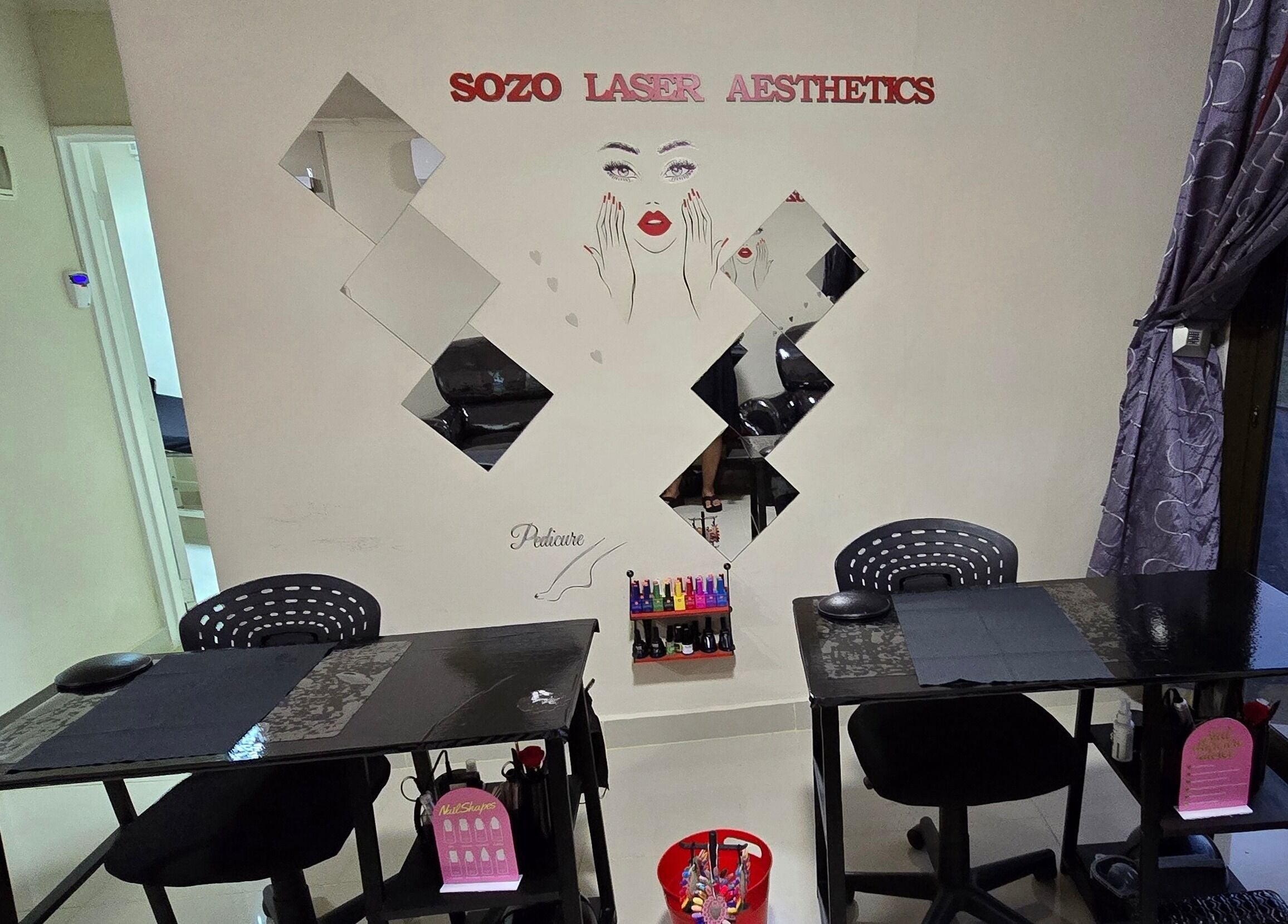 Cozy nail service area at Sozo Laser Aesthetics, Phoenix, Kwazulu-natal, ZA, showcasing polished decor.