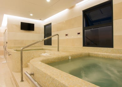 Relaxing spa jacuzzi at The Spa at Sun and Moon Urban, Phnom Penh, Phnom Penh, KH, offering tranquility and luxury.