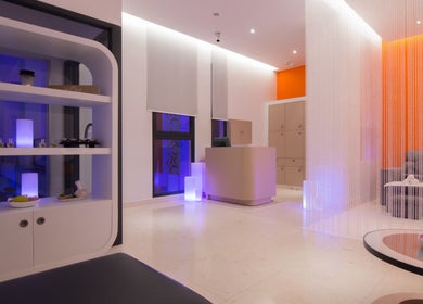 Modern reception area at The Spa at Sun and Moon Urban, Phnom Penh, showcasing elegant design and inviting ambiance.