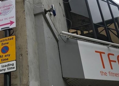 Entrance sign for JC Relaxation and Beauty above TFC Gym in Sheffield, England, GB