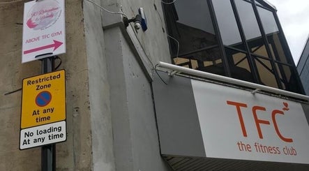 Entrance sign for JC Relaxation and Beauty above TFC Gym in Sheffield, England, GB