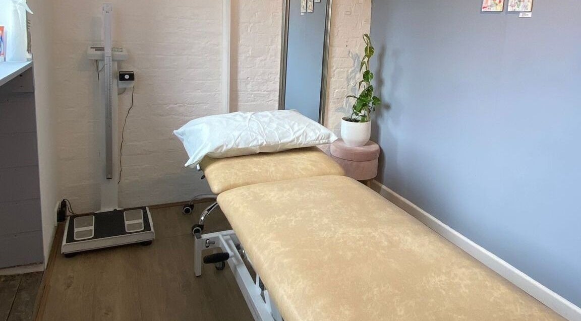 Tranquil therapy room at MG Osteopathy and Sports Injury Clinic, London, England, GB, featuring a treatment table.