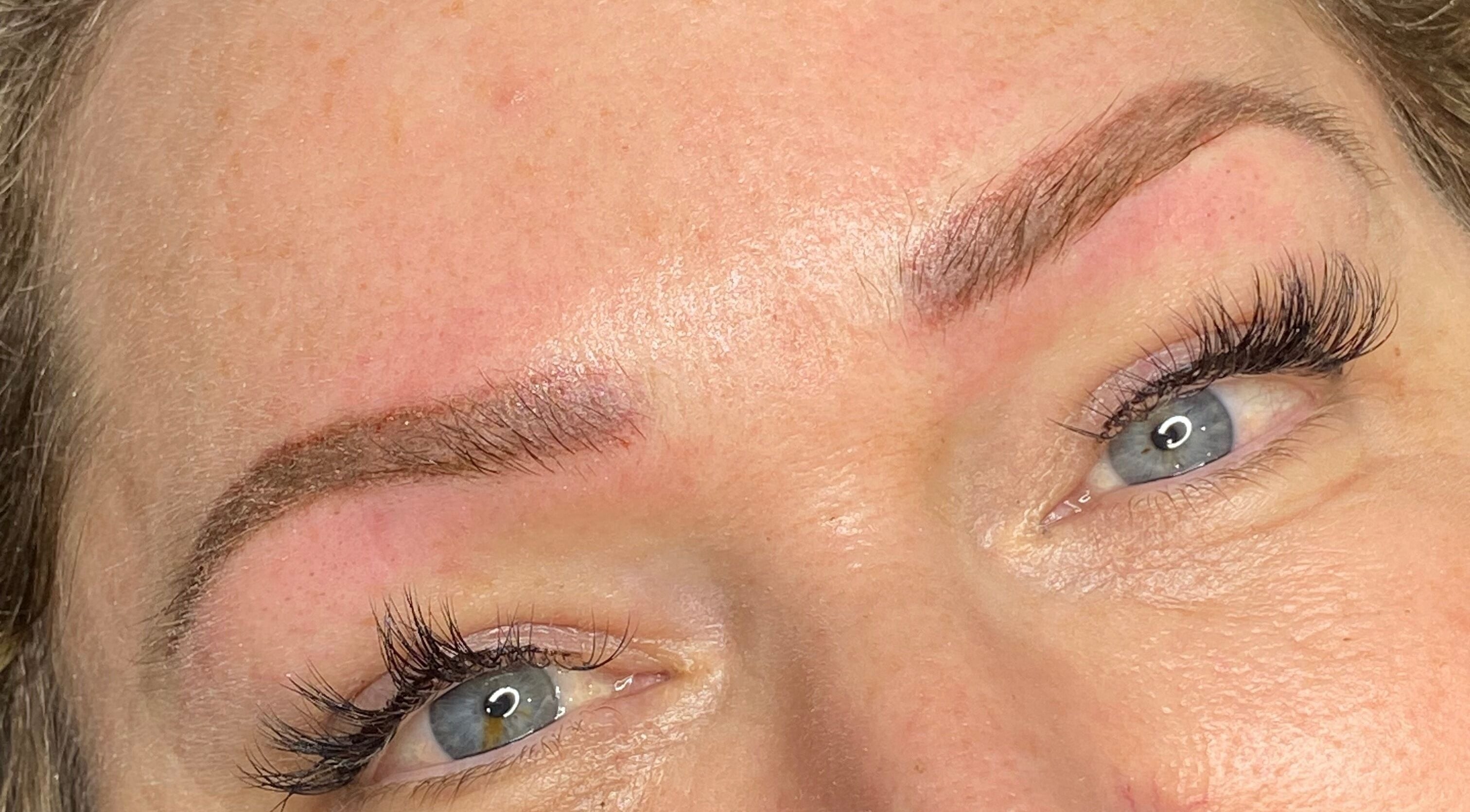 Close-up of refined eyebrow work by Tiffany MacDonald in Weybridge, England, emphasizing permanent makeup and aesthetics.