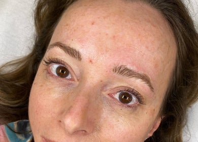 Client with fresh eyebrow treatment at Tiffany MacDonald - Permanent Make-Up in Weybridge, England, GB.