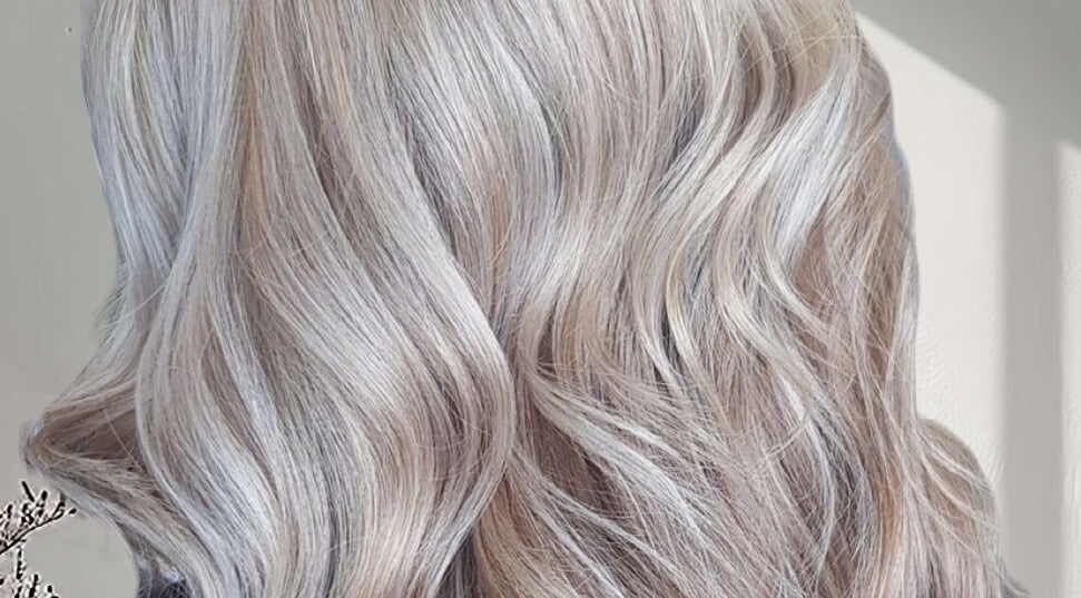 Elegant silver wavy hairstyle created at Hair by Tracey-Lee Brown in Newcomb, Victoria, AU.