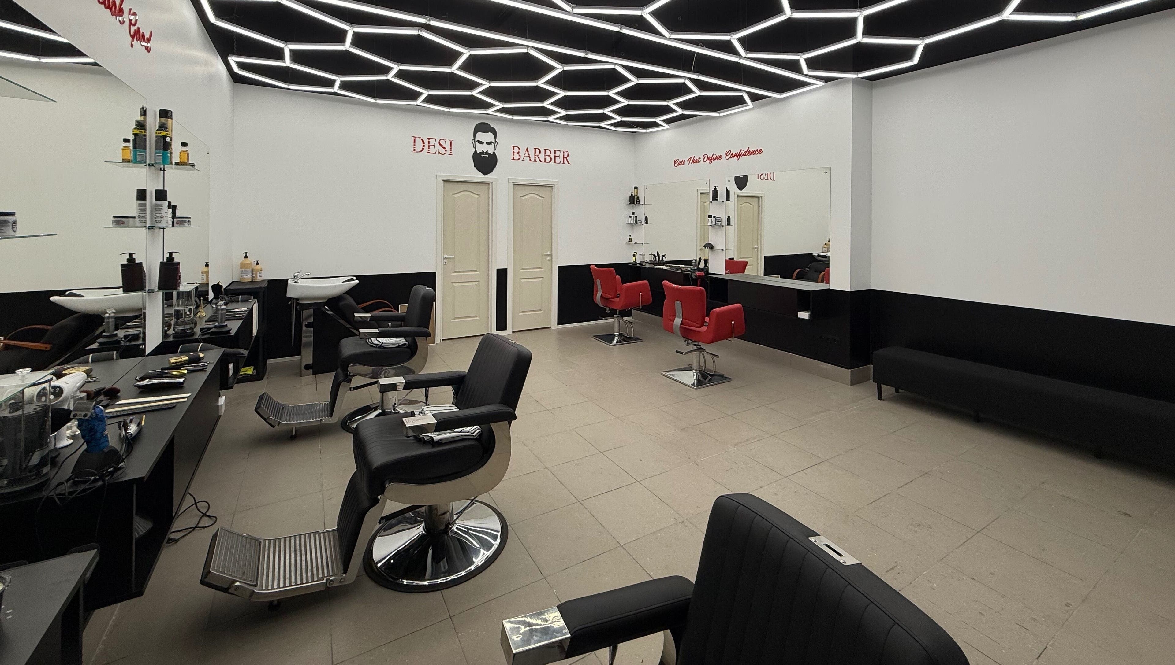 Chic interior of Desi (Āgenskalna Tirgus) barbershop in Rīga, LV with stylish chairs and mirrors.