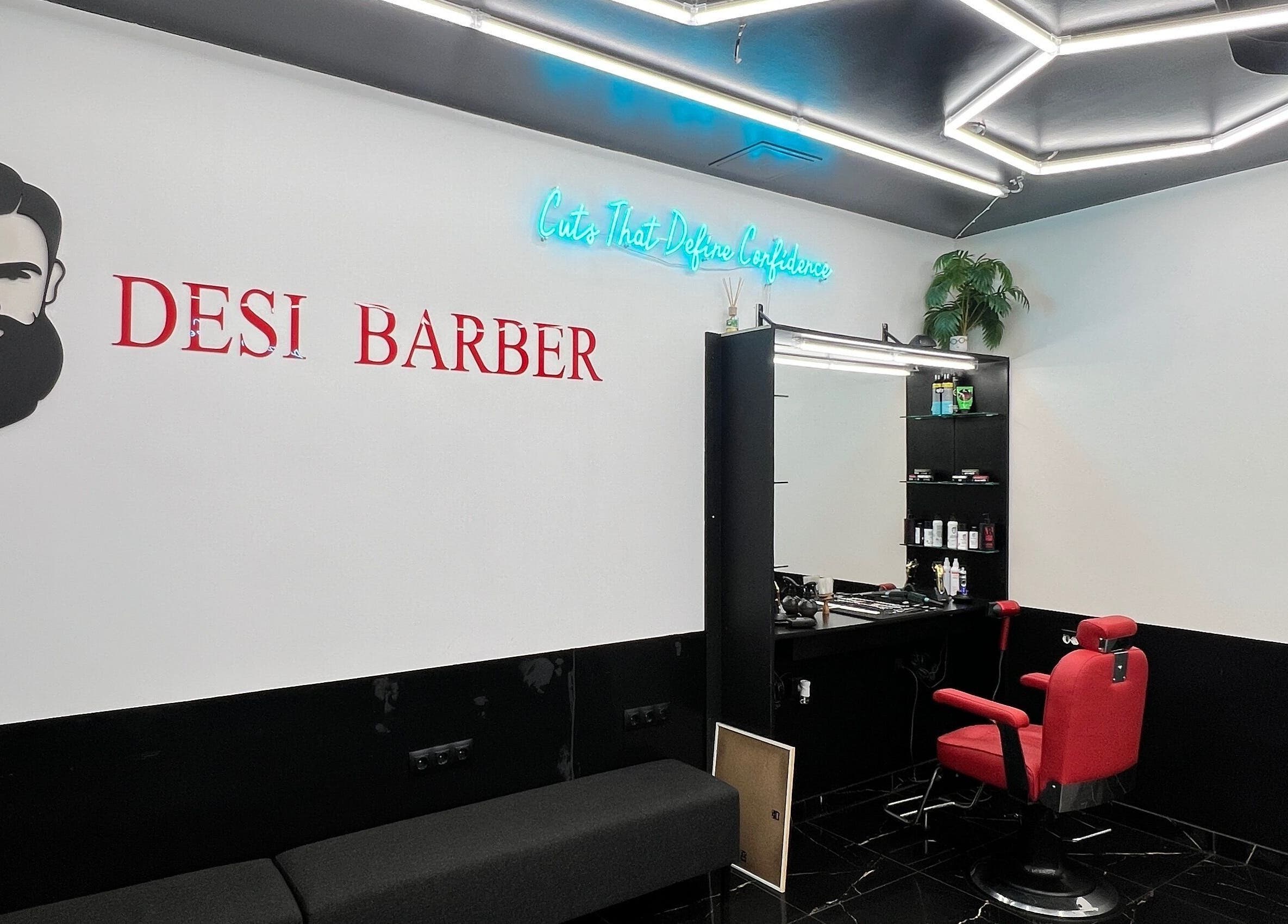 Modern barber station at Desi (Aleksandra Caka) in Rīga, LV with bold decor and vibrant red chair.